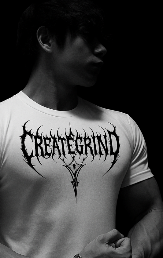 Person wearing a white t-shirt with 'CREATEGRIND' design on a black background